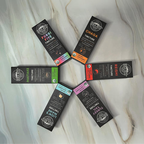 Mushroom Tinctures arranged in an asterisk shape