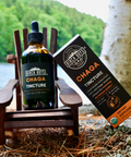 Birch Boys chaga tincture bottles and angled box on wooden tray