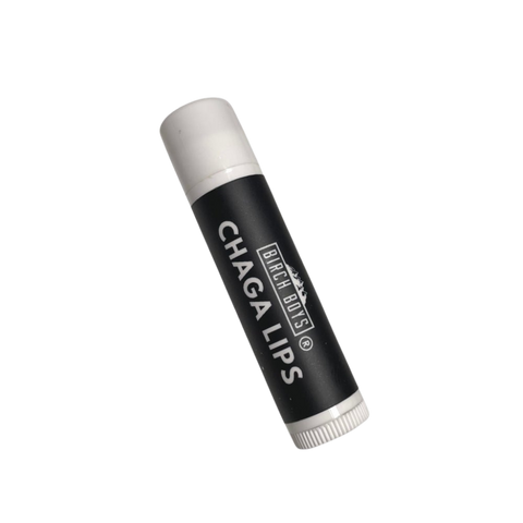Chaga lip balm tube with black body and white twist cap, printed label on front