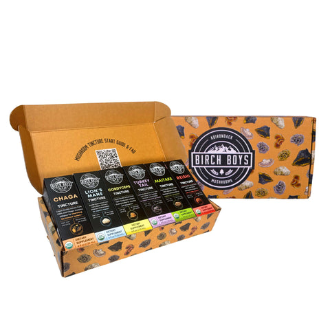 Open box of Birch Boys Tinctures with product packaging on a white background