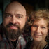 Gift wrap with photo of a smiling couple, man with beard and woman with short hair